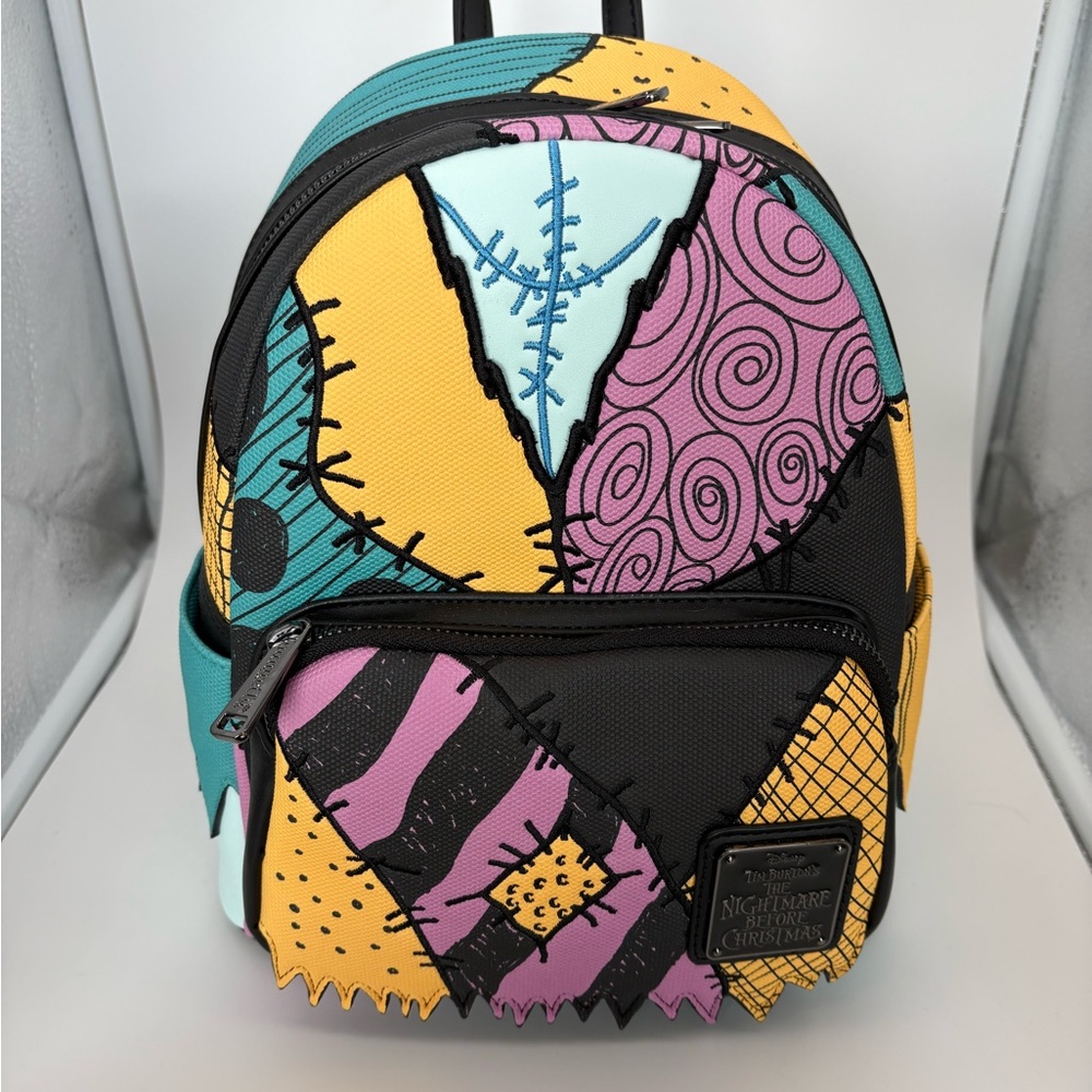 Loungefly Patchwork Mini Backpack in Teal, Yellow… - image 1